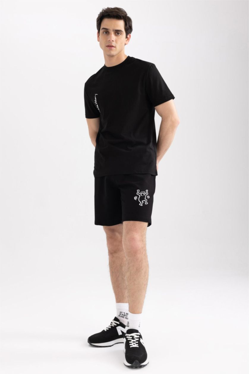HOMME Noir Short droit Keith Haring à coupe régulière