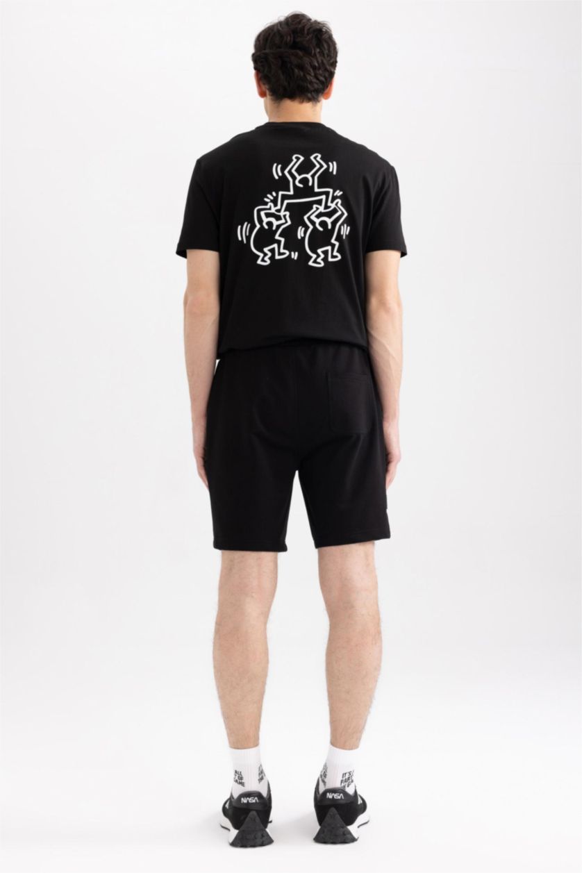 HOMME Noir Short droit Keith Haring à coupe régulière